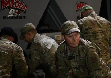 Guard personnel conduct sand bag filling operations in Skagit County