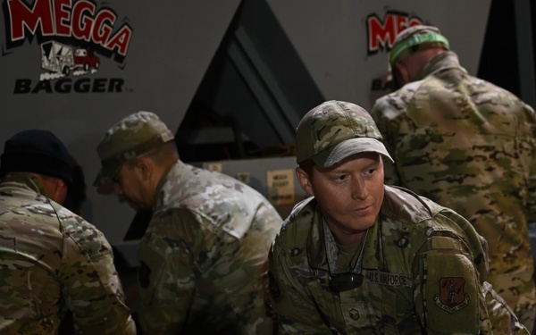 Guard personnel conduct sand bag filling operations in Skagit County