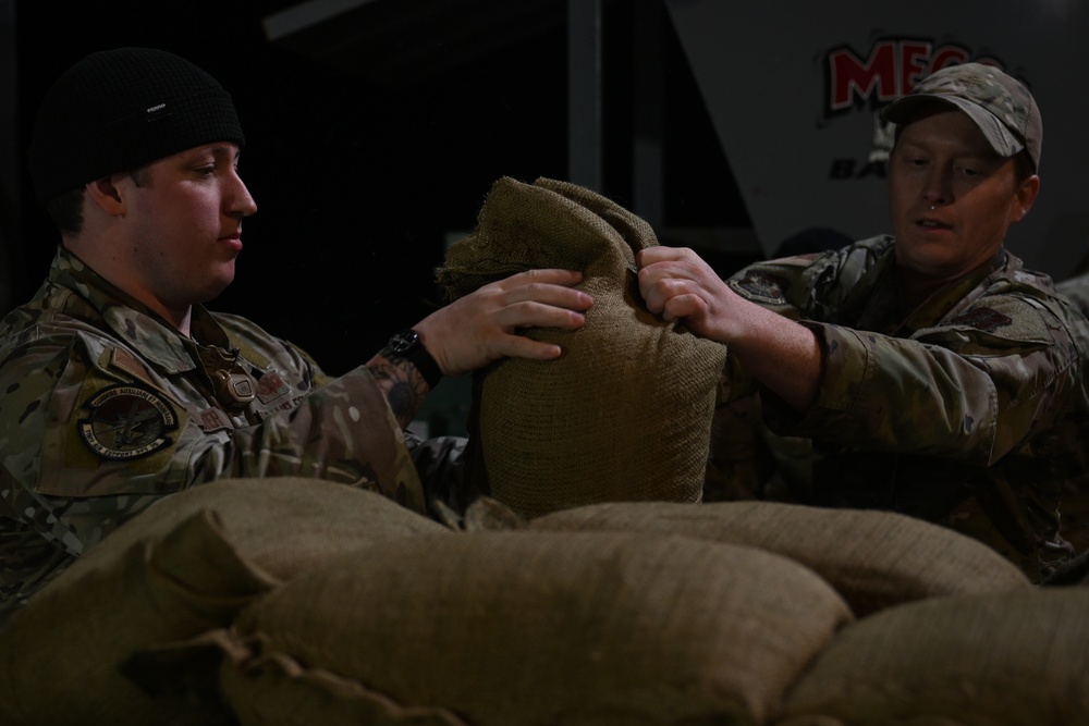 Guard personnel conduct sand bag filling operations in Skagit County