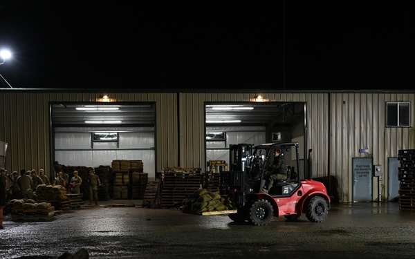 Guard personnel conduct sand bag filling operations in Skagit County