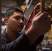 Boxer Sailors maintain engineering spaces