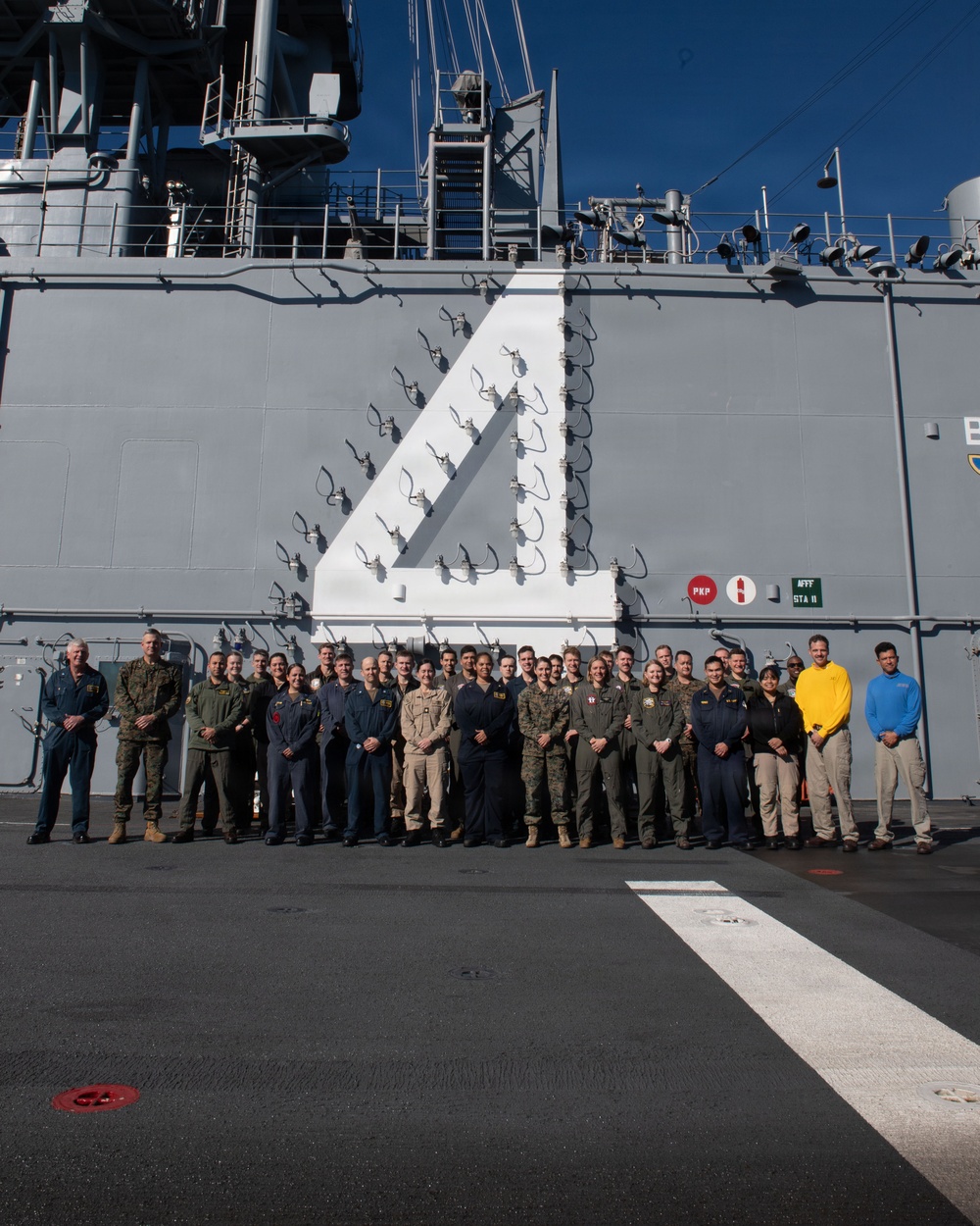 USNA Graduates aboard Boxer celebrate Army-Navy game