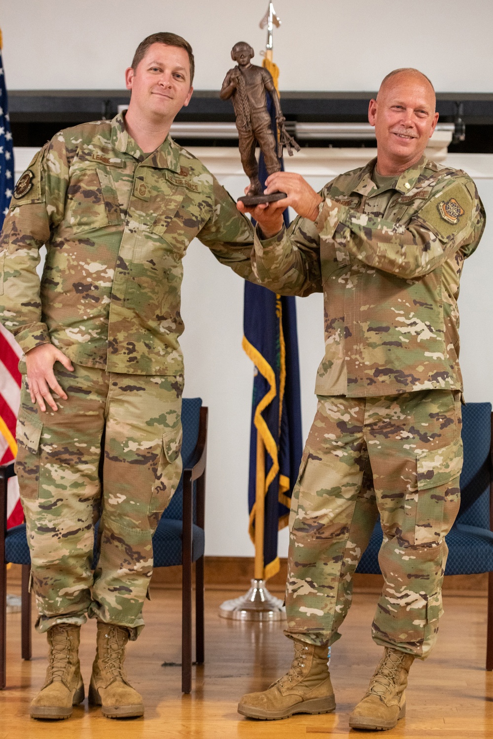 Raymond retires, concluding more than two decades of military service