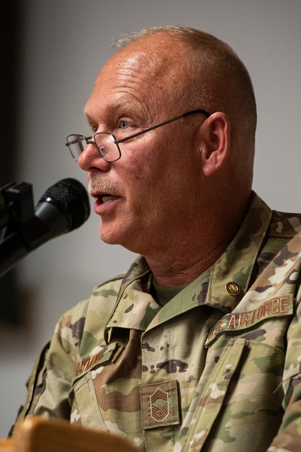 Raymond retires, concluding more than two decades of military service