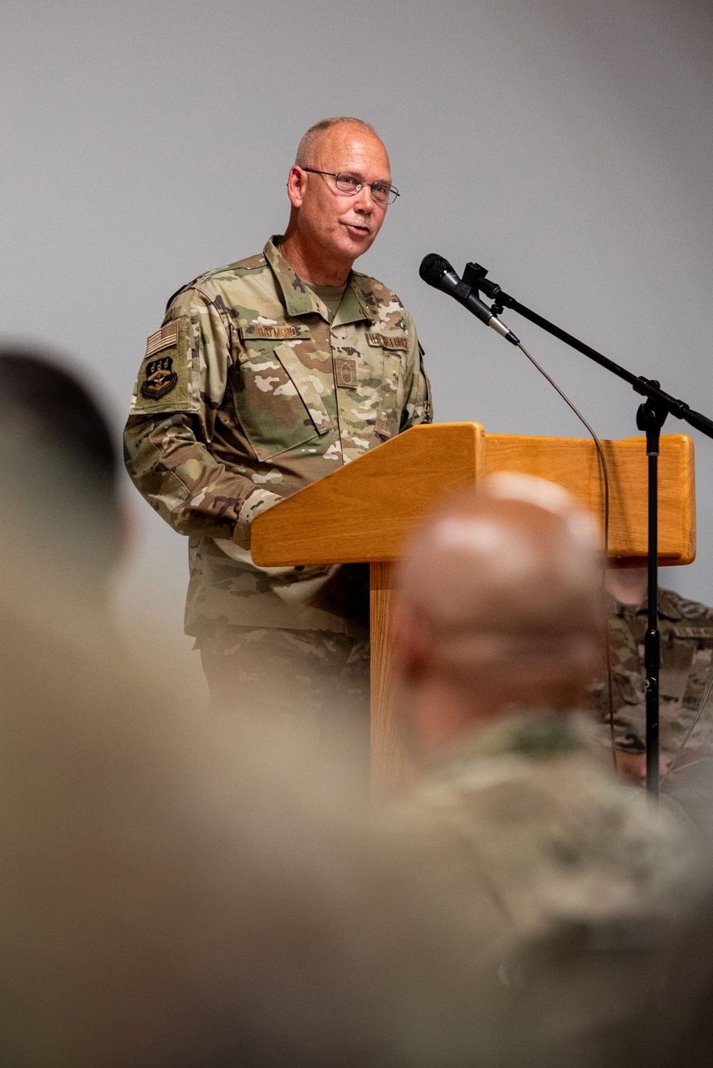 Raymond retires, concluding more than two decades of military service