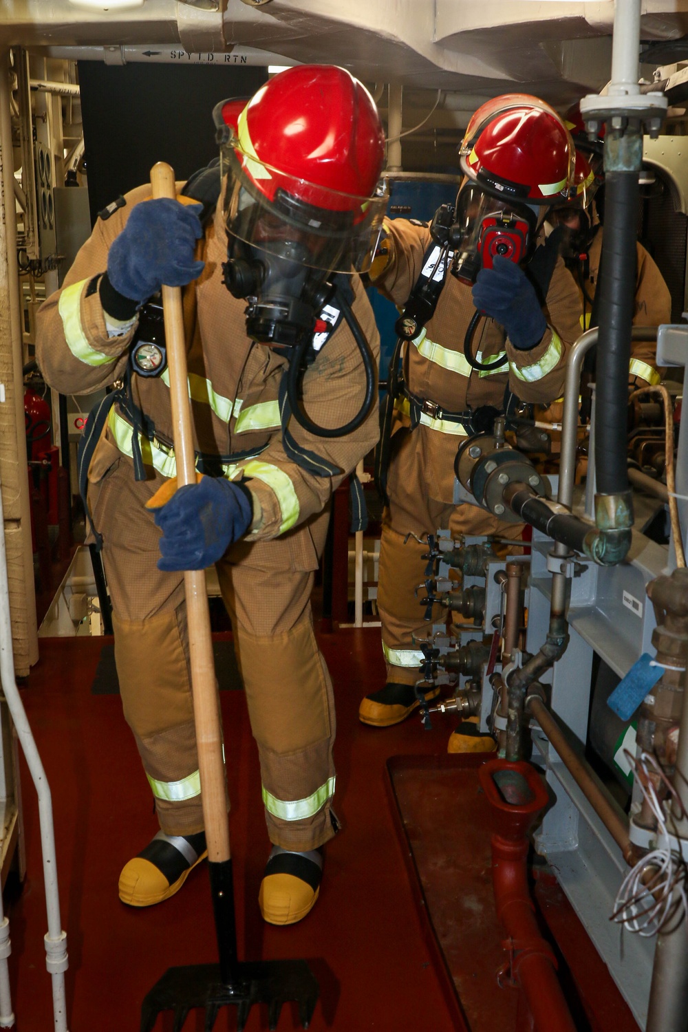 Frank E. Petersen Jr. conducts main space fire drill