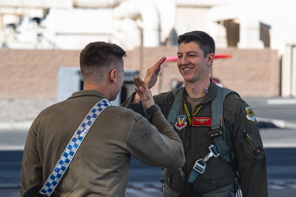64th Aggressor Squadron pilot and crew chief