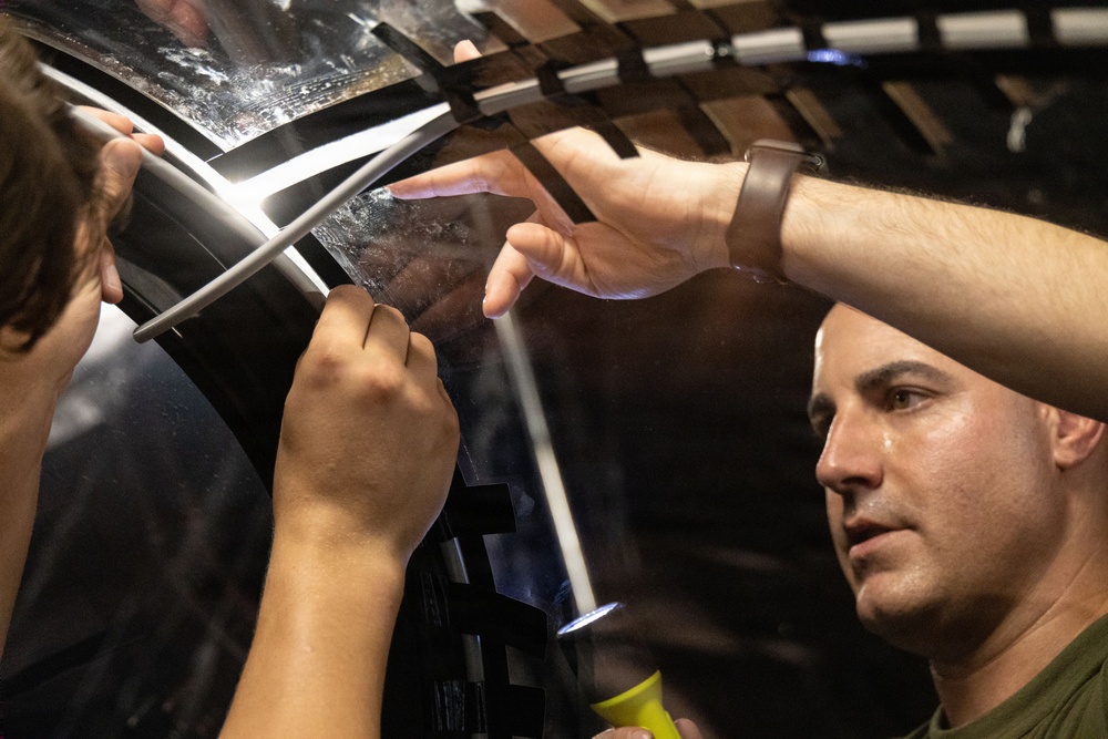 VMFA-225 Marines install Flexible Linear Shaped Charge on a new F-35 canopy