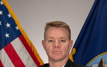 Navy Recruiter Poses For Portrait