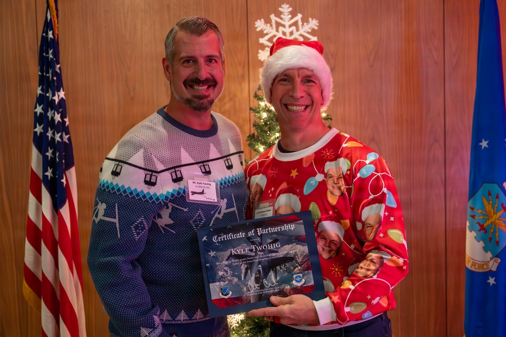 92nd ARW celebrates holidays, inducts new Honorary Squadron Commanders