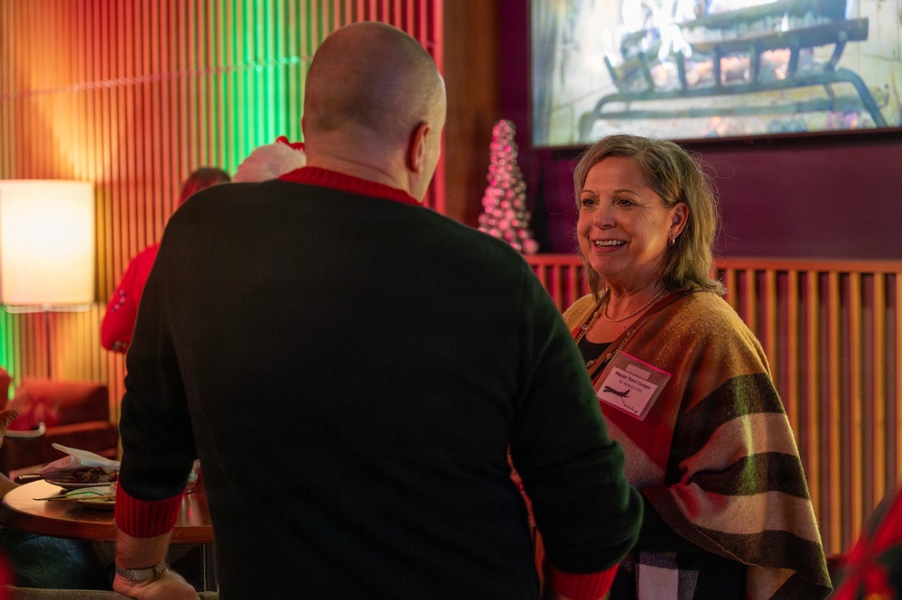 92nd ARW celebrates holidays, inducts new Honorary Squadron Commanders