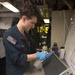Nimitz Sailor Performs Maintenance On Air Conditioner Filter