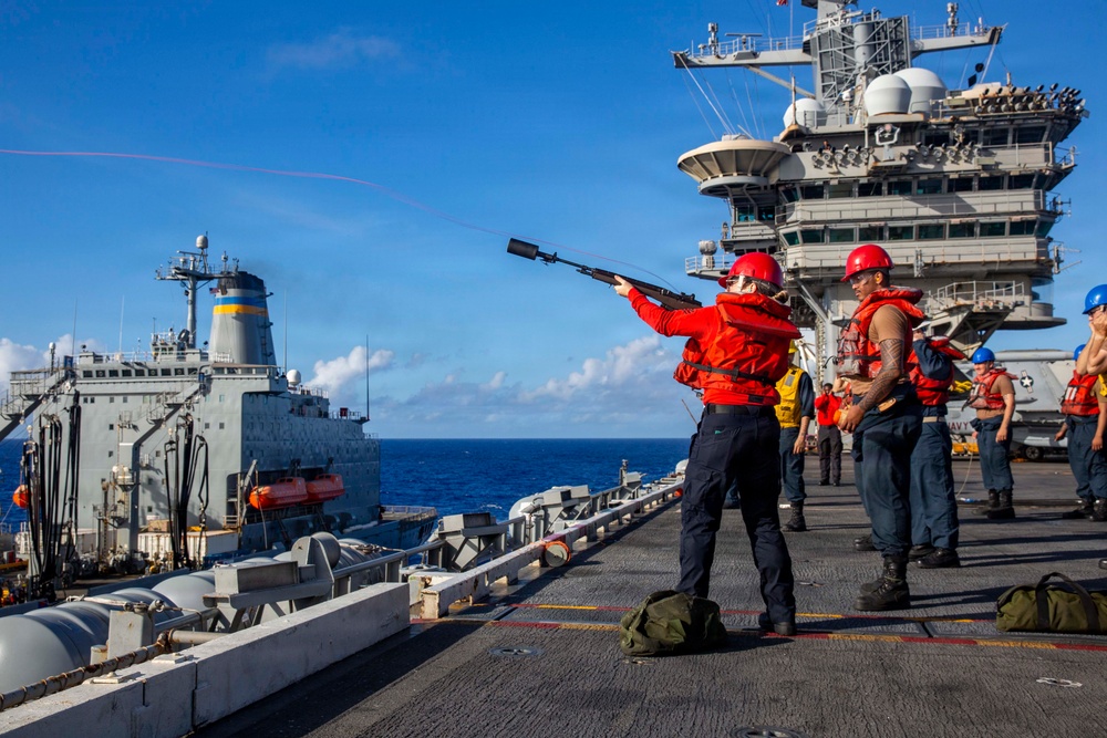 Abraham Lincoln conducts a fueling-at-sea with Henry J. Kaiser