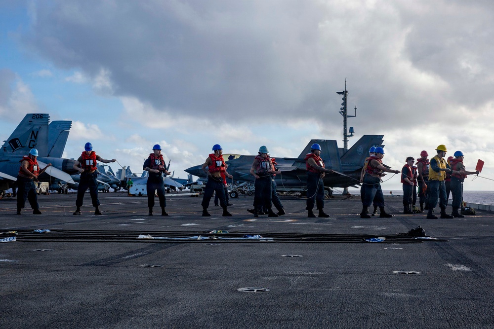 Abraham Lincoln conducts a fueling-at-sea with Henry J. Kaiser
