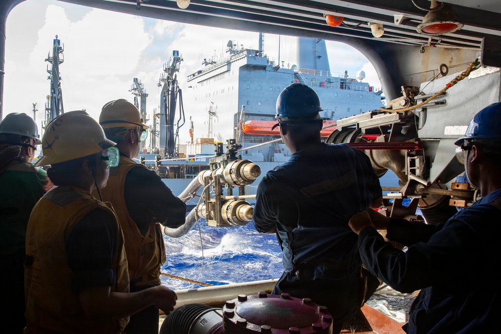 Abraham Lincoln conducts a fueling-at-sea with Henry J. Kaiser
