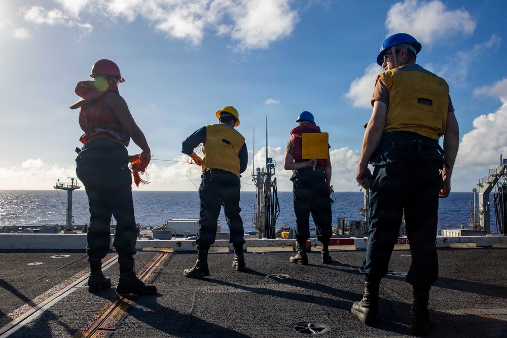 Abraham Lincoln conducts a fueling-at-sea with Henry J. Kaiser