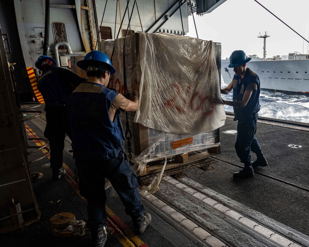 Nimitz Sailors Onload Cargo During A Replenishment At Sea