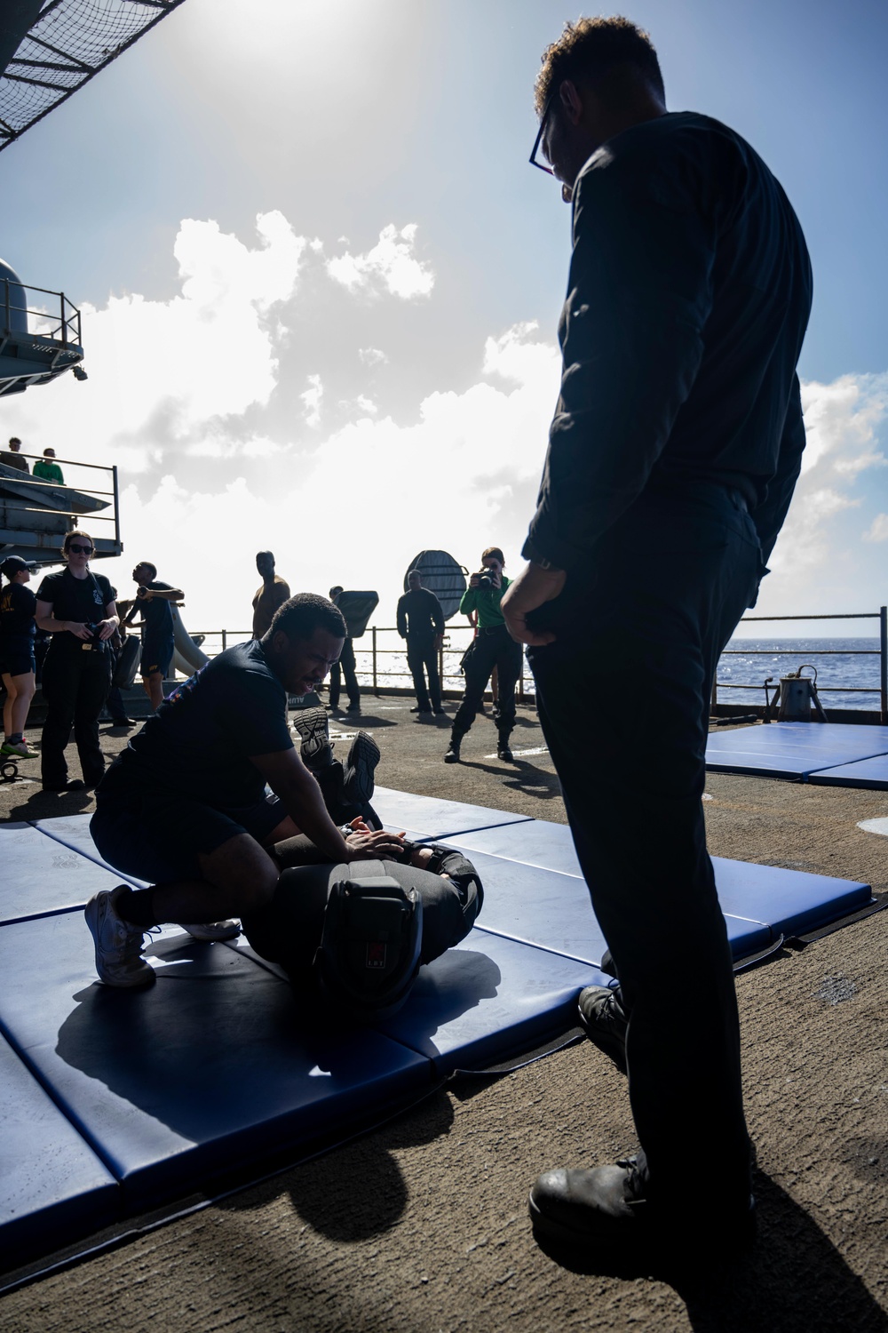Nimitz Sailors Participate In OC Spray Training Evolution