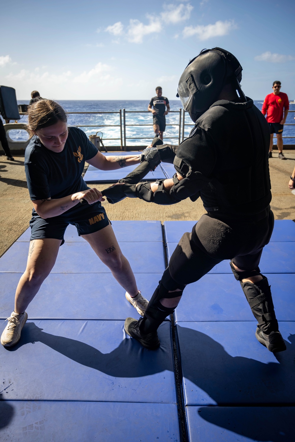 Nimitz Sailors Participate In OC Spray Training Evolution