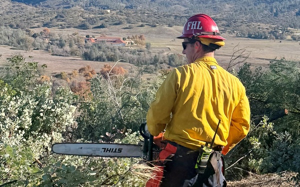 Clearing area around the cross at FHL