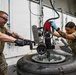 379th Expeditionary Maintenance Squadron maintainers inspect and repair KC-135 Stratotanker aircraft wheel and tire