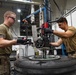 379th Expeditionary Maintenance Squadron maintainers inspect and repair KC-135 Stratotanker aircraft wheel and tire