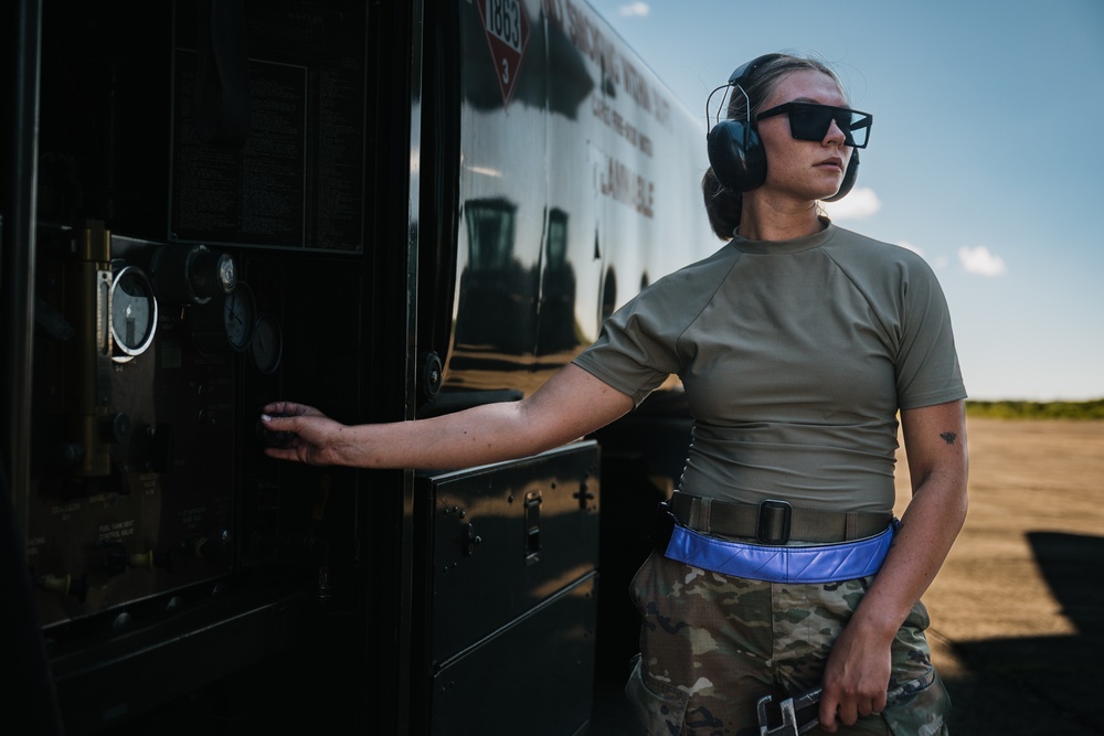 346th AEW offloads lowboy trailer from C-17