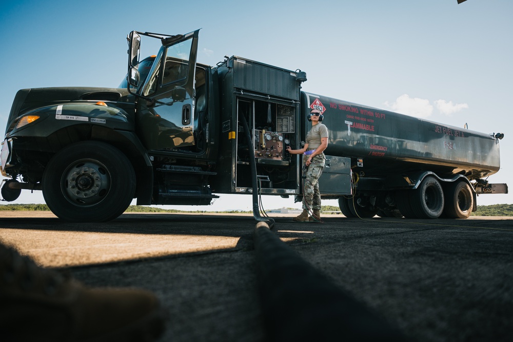 346th AEW offloads lowboy trailer from C-17