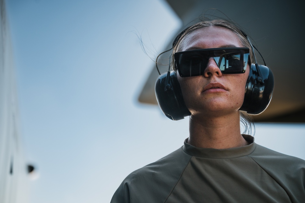 346th AEW offloads lowboy trailer from C-17