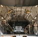 346th AEW offloads lowboy trailer from C-17