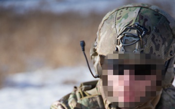 Special Operator hangs mortar round