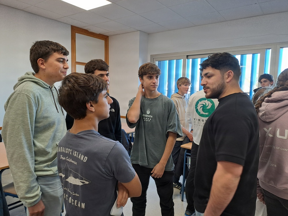 Sailors participate in language exchange event with local high school students