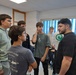 Sailors participate in language exchange event with local high school students