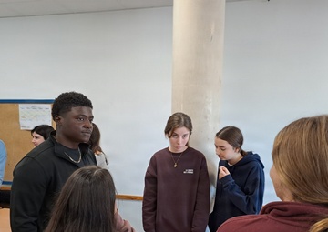 Sailors participate in language exchange event with local high school students