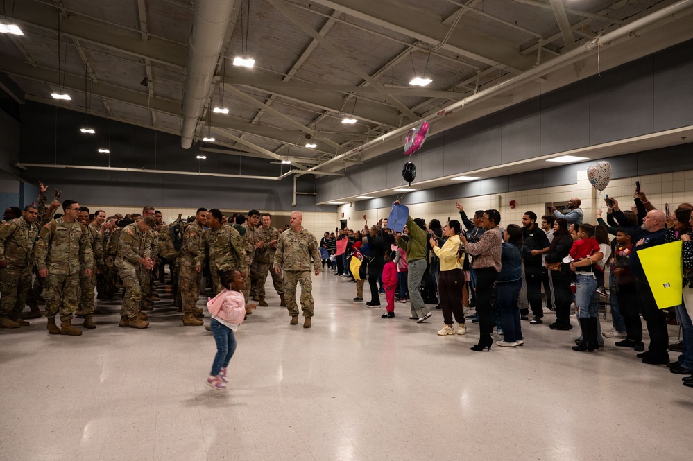 Friends and family welcome home 990th EVCC Soldiers