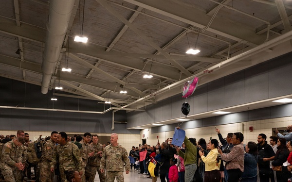 Friends and family welcome home 990th EVCC Soldiers