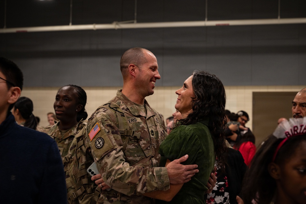 Friends and family welcome home 990th EVCC Soldiers