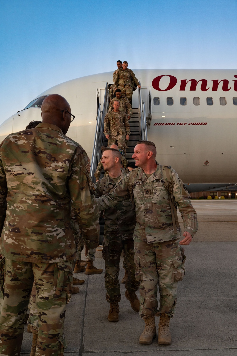 Friends and family welcome home 990th EVCC Soldiers
