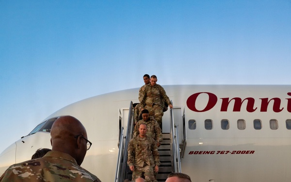 Friends and family welcome home 990th EVCC Soldiers