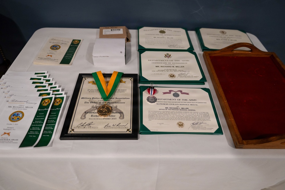 OPMG celebrates Miller decades of service