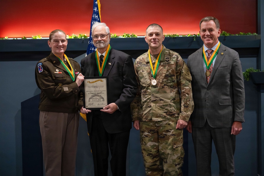 OPMG celebrates Miller decades of service