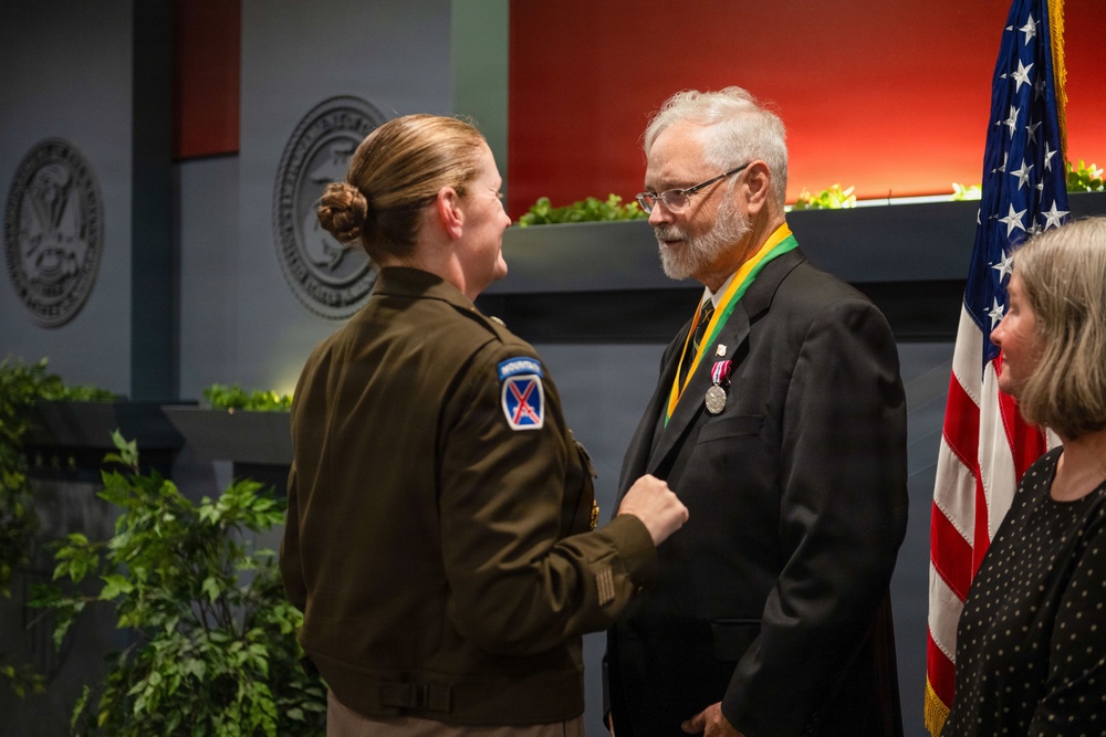 OPMG celebrates Miller decades of service