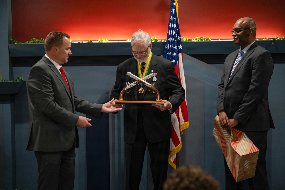 OPMG celebrates Miller decades of service