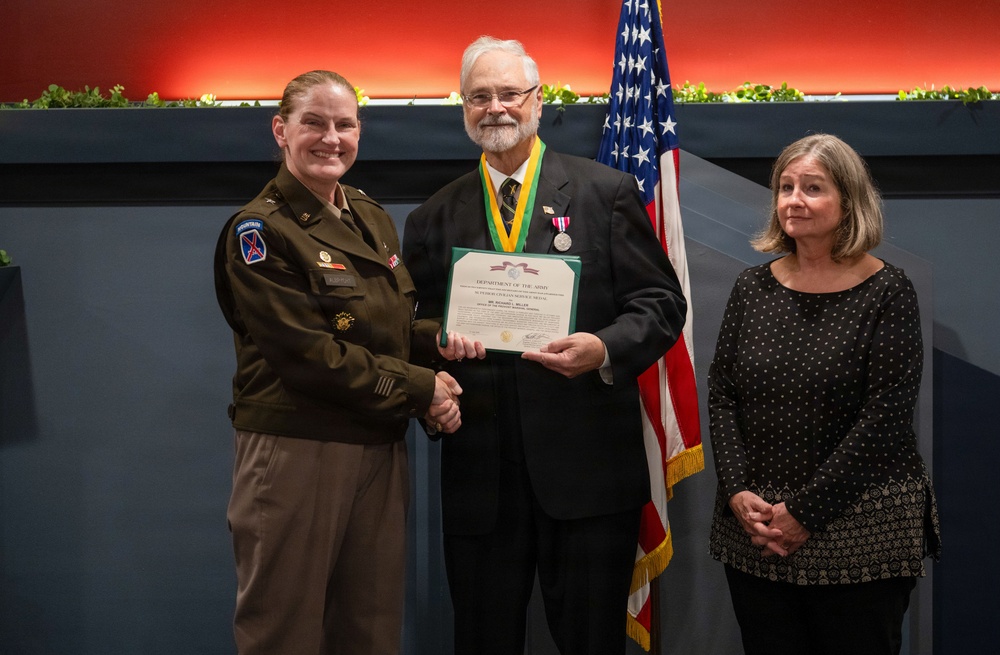 OPMG celebrates Miller decades of service