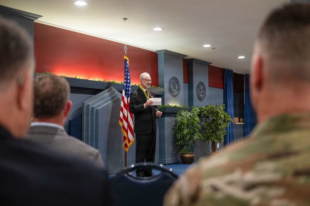 OPMG celebrates Miller decades of service