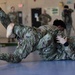 Airmen grapple in Clash of the Dragons
