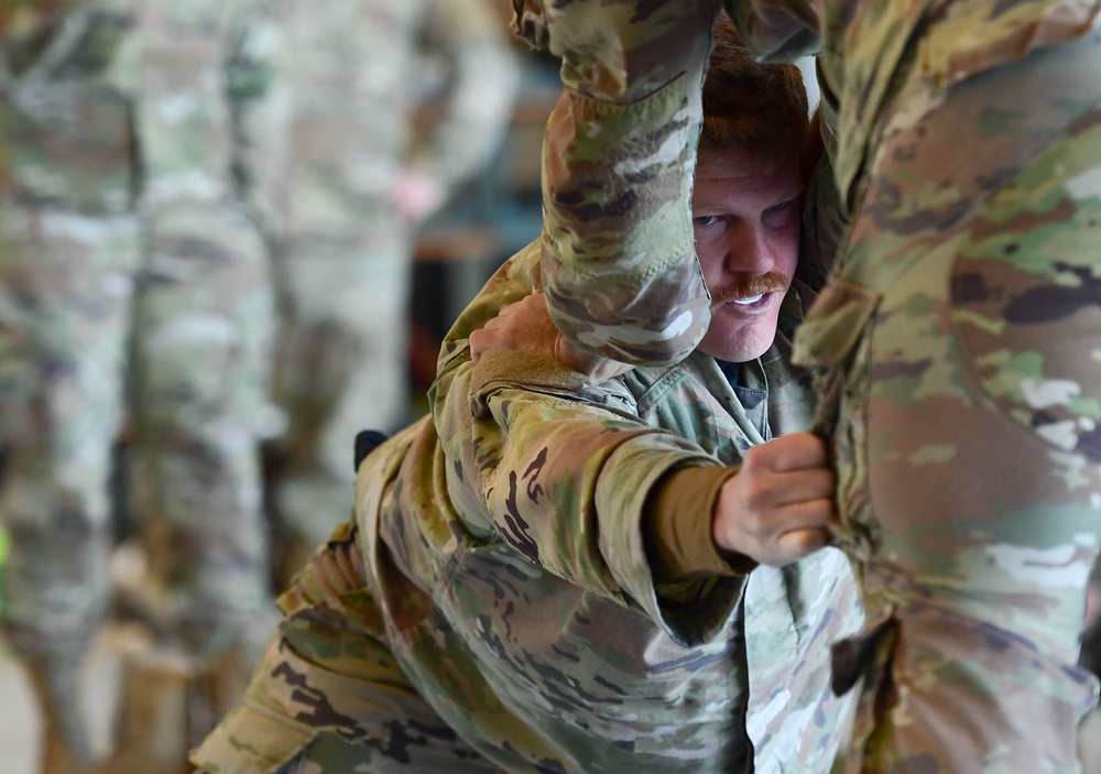 Airmen grapple in Clash of the Dragons