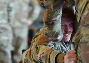 Airmen grapple in Clash of the Dragons