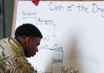 Airmen grapple in Clash of the Dragons