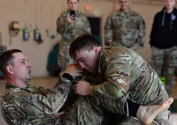 Airmen grapple in Clash of the Dragons